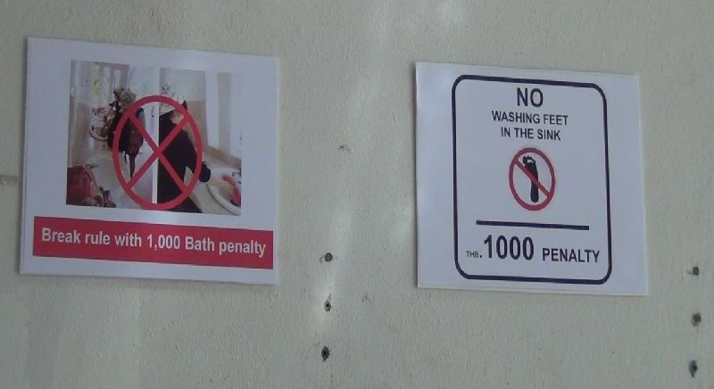 A sign in Pi Pi Islands National Park telling tourists not to wash their feet in the sink.