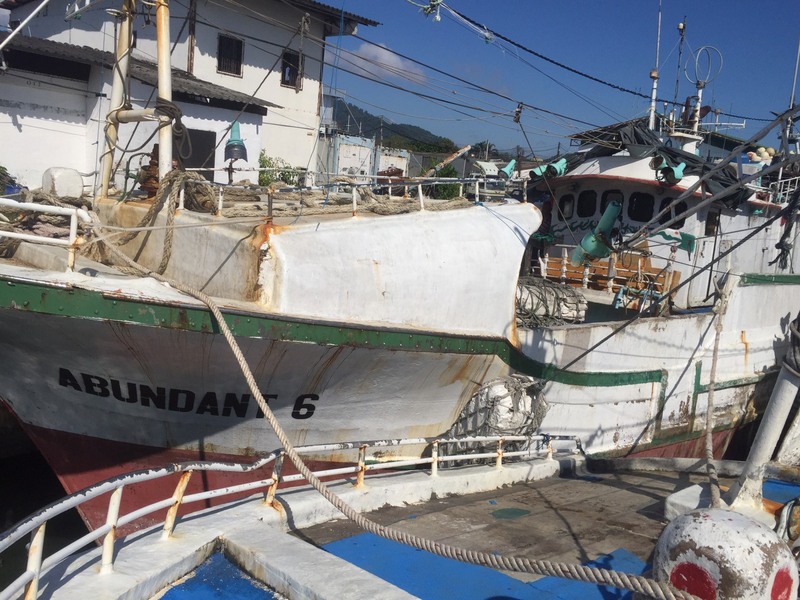 The seven suspected IUU fishing boats, falsely reported as registered in Bolivia, were seized at the Phuket’s Sri Thai Pier in Rassada. Photo: Royal Thai Navy