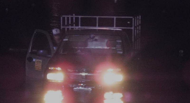 Rising tide leaves pickup sunk in Phuket sand