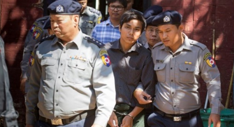 Reuters says journalists arrested for probing Rohingya massacre