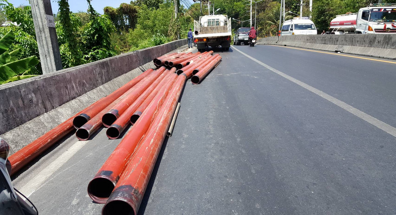 Myanmar worker injured as Phuket truck spills steel pipes