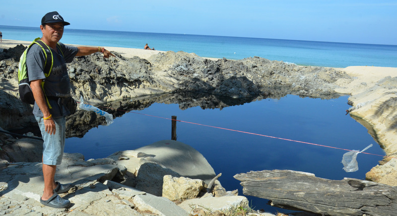 Phuket residents call for end to black wastewater on Surin Beach