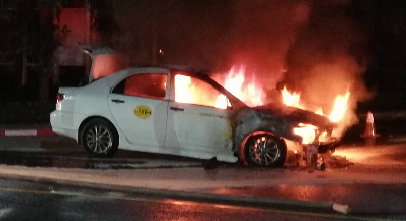 Phuket tourists escape as taxi bursts into flames