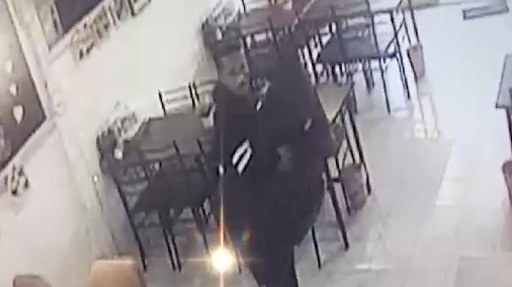 Police search for man in black over bold restaurant TV theft