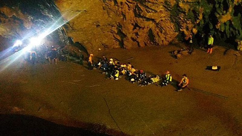 Rising water obstructs cave search of trapped students, coach