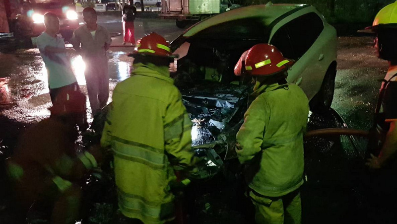 Volvo car up in flames at Phuket temple