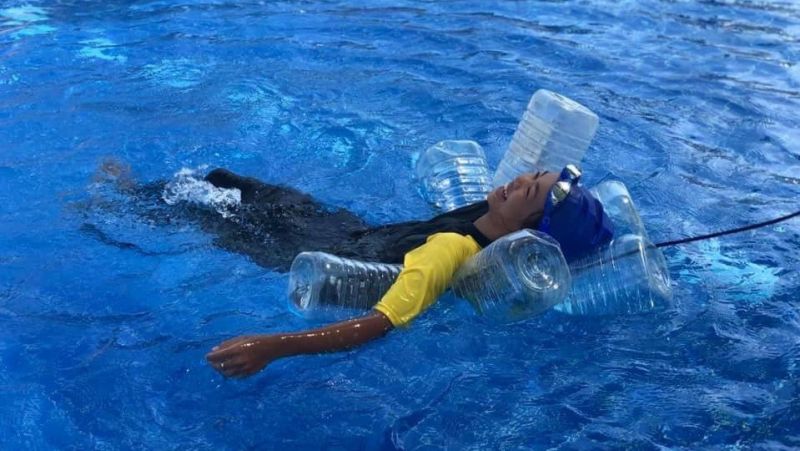 Myanmar children in Phuket celebrate their new-found swimming ability