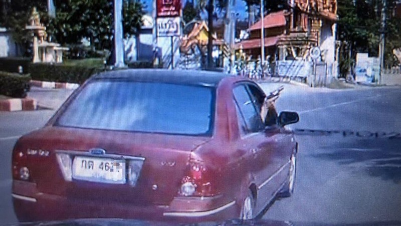 Manhunt after driver flashes gun at road user