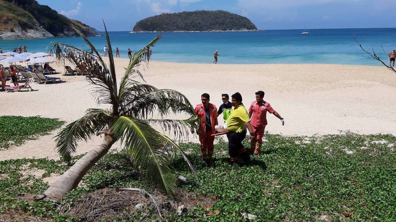 Body of man washed off rocks while fishing washes ashore at Nai Harn Beach