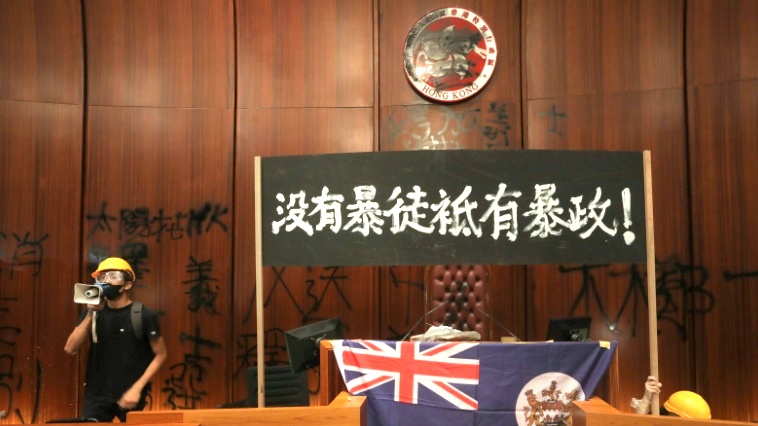 Hong Kong police retake parliament from anti-government protesters
