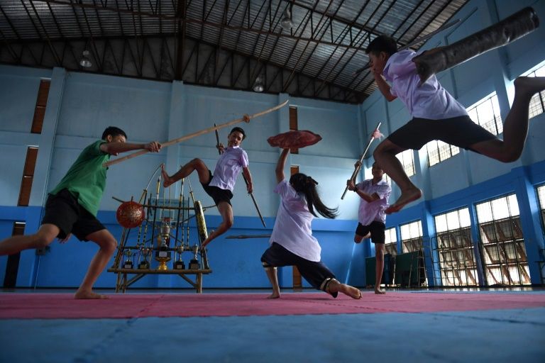 With swords and stunts, Thai youth embrace ancient martial art