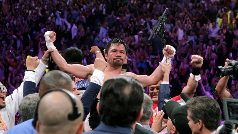 Pacquiao mulls future after title stunner
