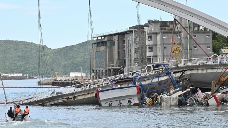 Taiwan bridge collapses, rescuers fear six trapped