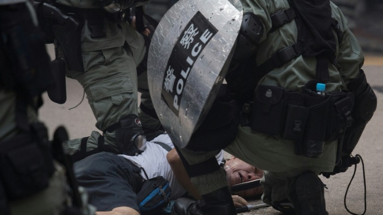 Police shoot Hong Kong protester as China celebrates 70th birthday