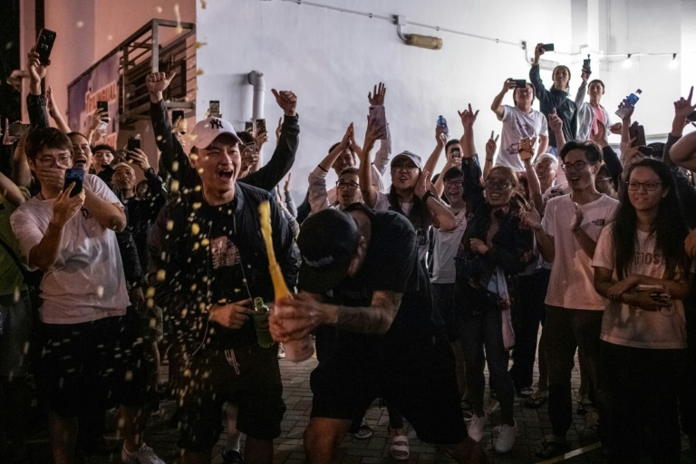 Hong Kong democracy camp heads for stunning polls win, reports local media