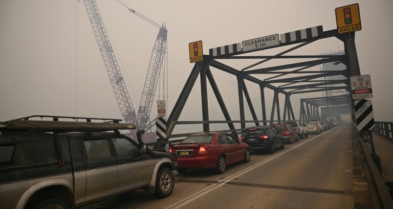 Australia orders mass evacuation of fire-ravaged towns before heatwave