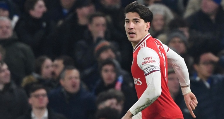 Ten-man Arsenal hold Chelsea in torrent of Premier League late goals