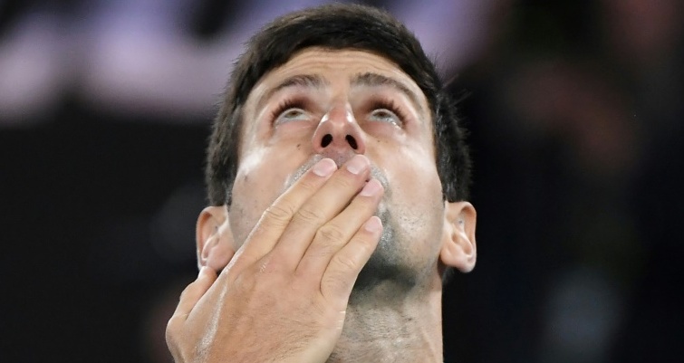 Djokovic beats Thiem in five-set epic to win eighth Australian Open
