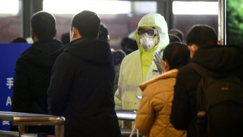 China stutters back to work as virus deaths soar