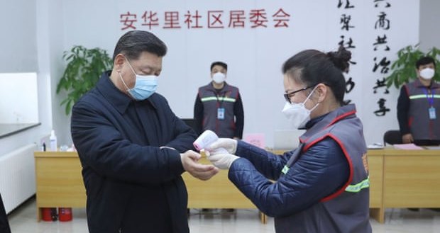 China virus toll passes 1,000 as Xi visits frontline hospital
