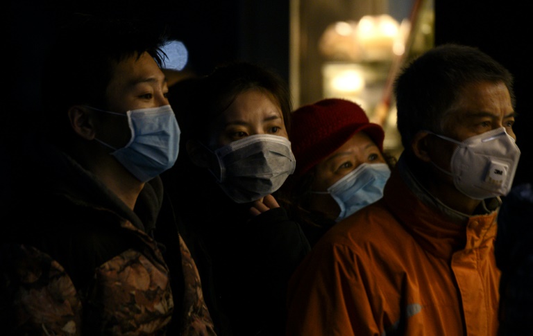 Death toll in China epidemic surges past 1,500