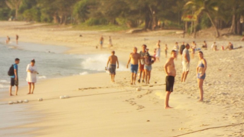 Phuket beach ban breakers scramble as police arrive