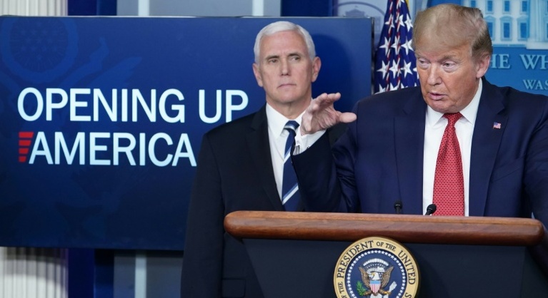 US outlines phased reopening, as China faces virus ire