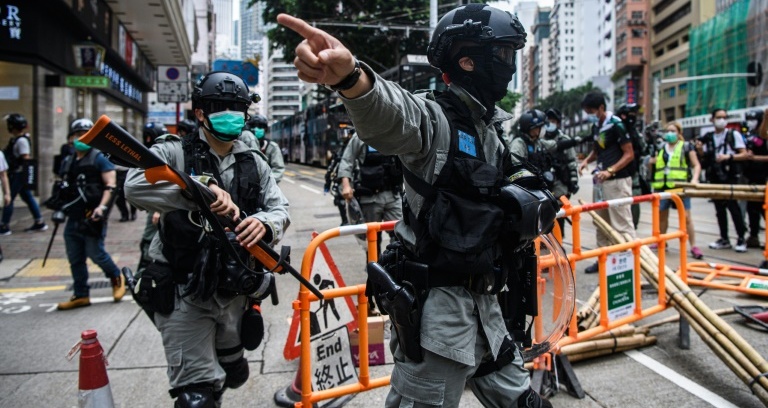 Hong Kong leader tries to reassure investors rattled by China law