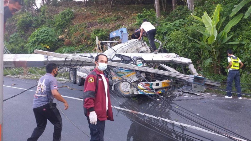 Two dead as truck hits power pole