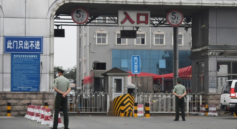 Lockdown returns in parts of Beijing as China reports 57 new virus cases