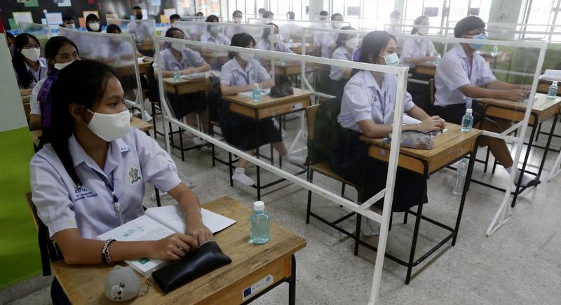 COVID crisis compounds new school-term woes