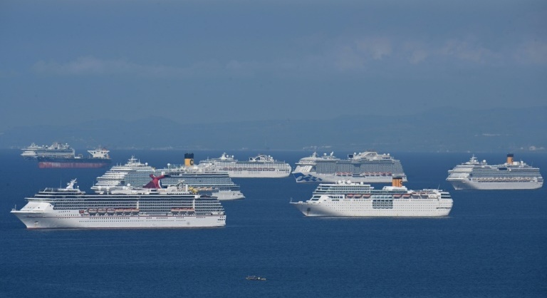 Stranded on ships, 200,000 seafarers struggle in virus limbo