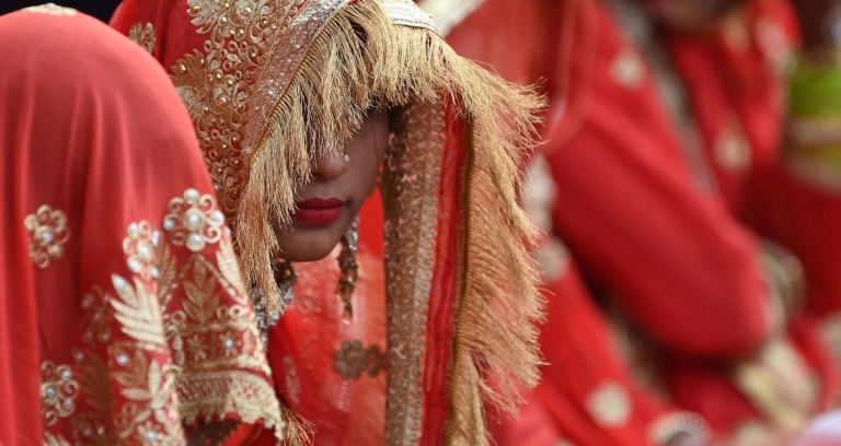 Virus despair forces girls across Asia into child marriage