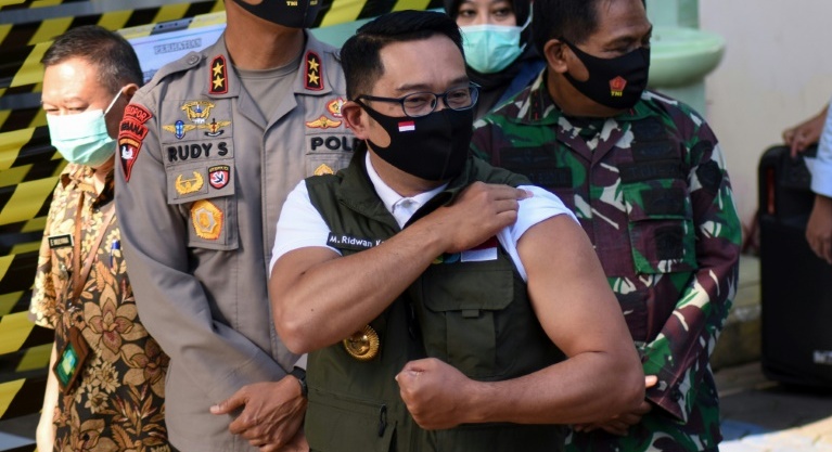 WHO tempers quick vaccine hopes