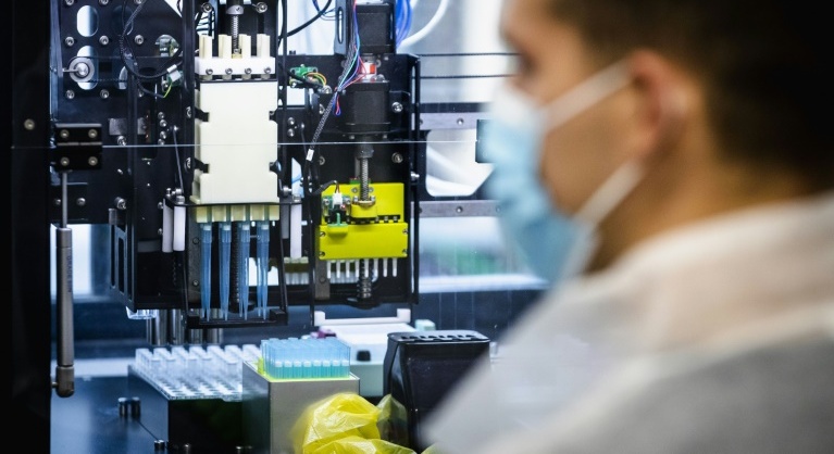 Britain okays vaccine as global COVID death toll nears 1.5 million