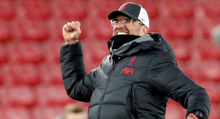 Liverpool spark Anfield party to join Spurs at top of Premier League