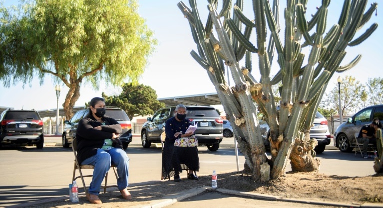 UK to start vaccine jab rollout as south California locks down