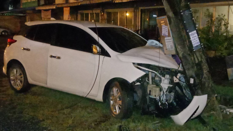 Man, woman injured as car slams power pole