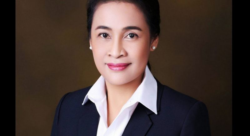 Kanokwan suspended over land