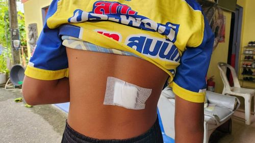 Attacker who stabbed three boys outside school surrenders
