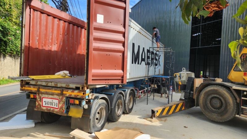 Truck driver crushed by glass frame