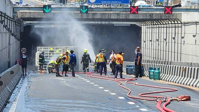 Bypass reopens after gas-cylinder truck overturns at underpass