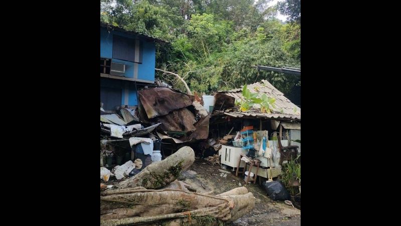 House crushed by fallen tree branch in Phuket Town