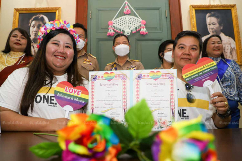 A couple register their partnership at an event held in Dusit district to celebrate Valentine’s Day in February. Photo: Bangkom Post