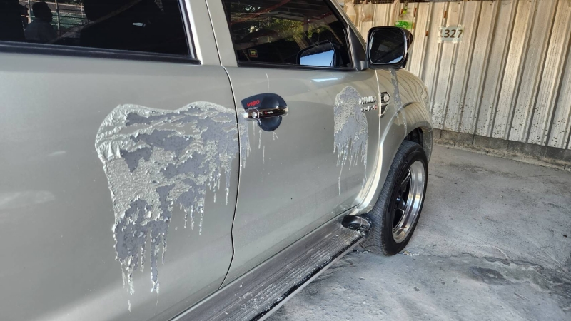 Police probe ‘paint stripper splash’ in neighbour dispute