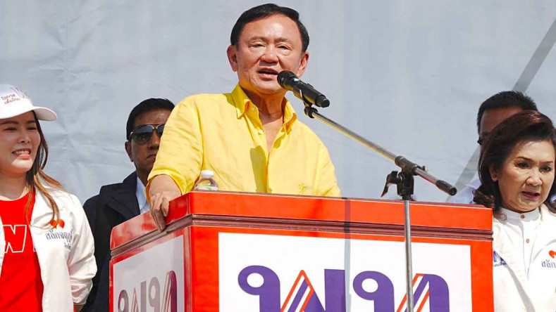 Thaksin dedicates himself to fixing the economy