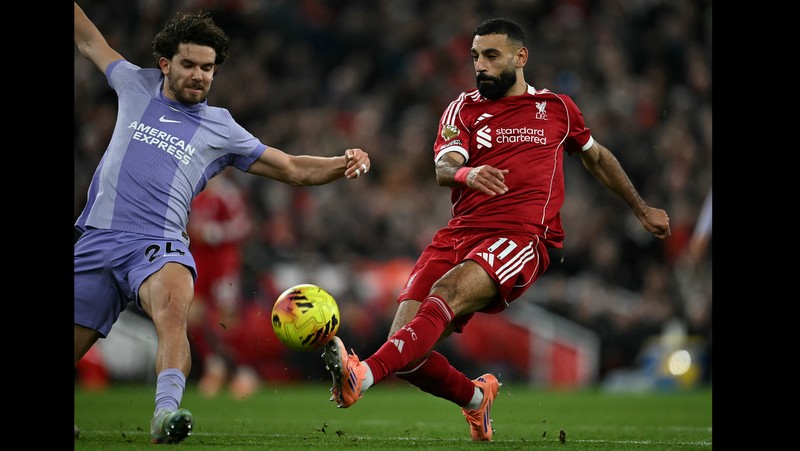 Salah back in Liverpool fold as Arsenal grab last-gasp win