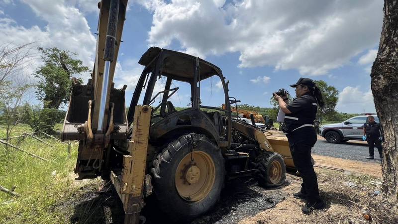 Police probe suspected backhoe arson