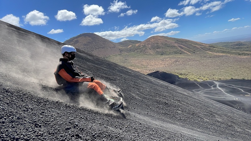 Todd volcano boarding down Cerro Negro, Nicaragua, March 2026, a month before turning 60. Photo: Todd Miller