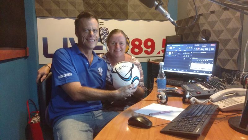 Donna chatting with Martin Hill about FC Porto International Camp